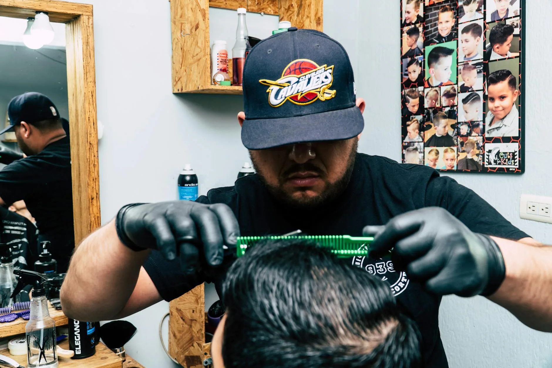 Licensed barber consulting with a client during a haircut