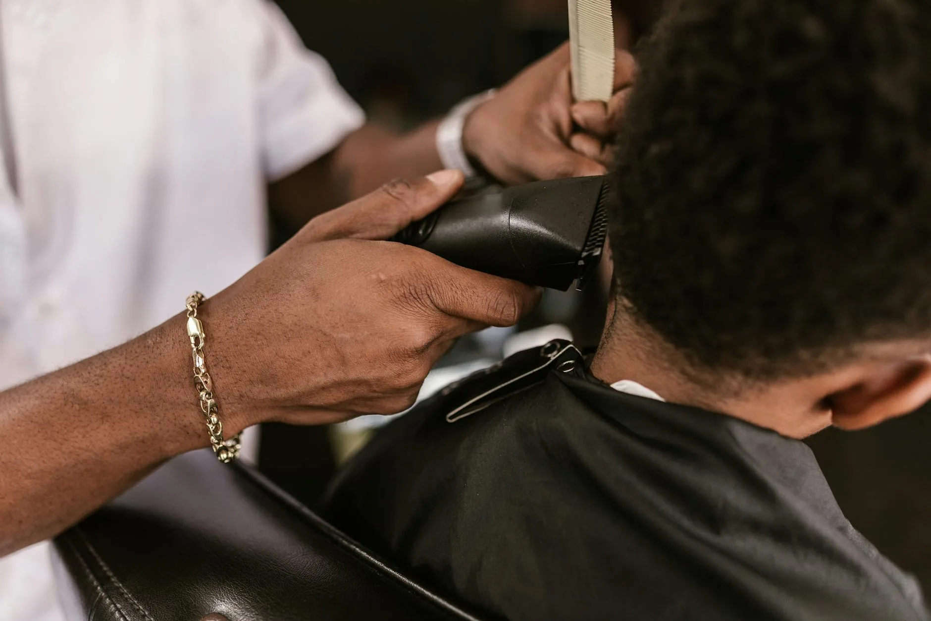 Barber cutting hair