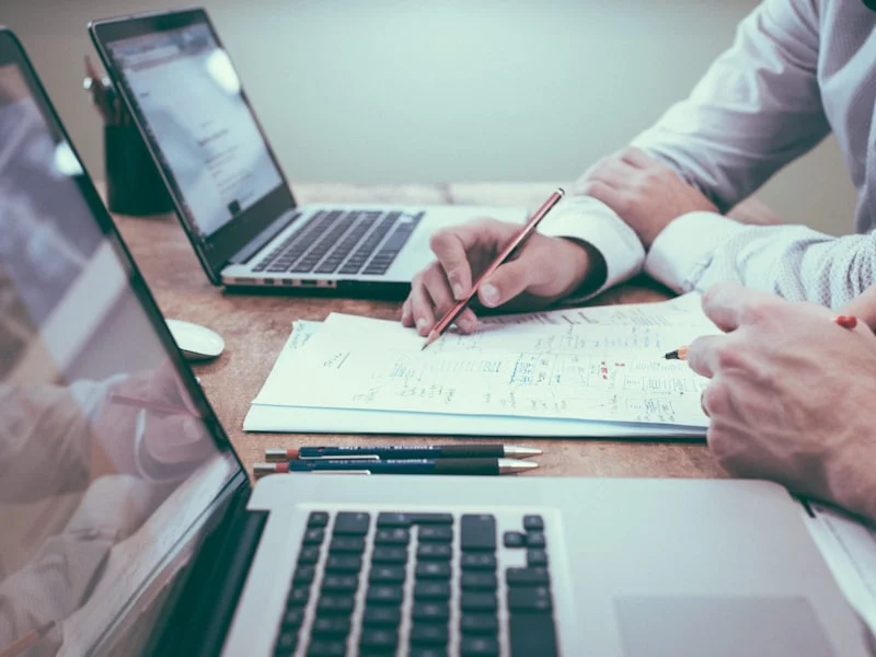 Insurance agent reviewing coverage information with a client