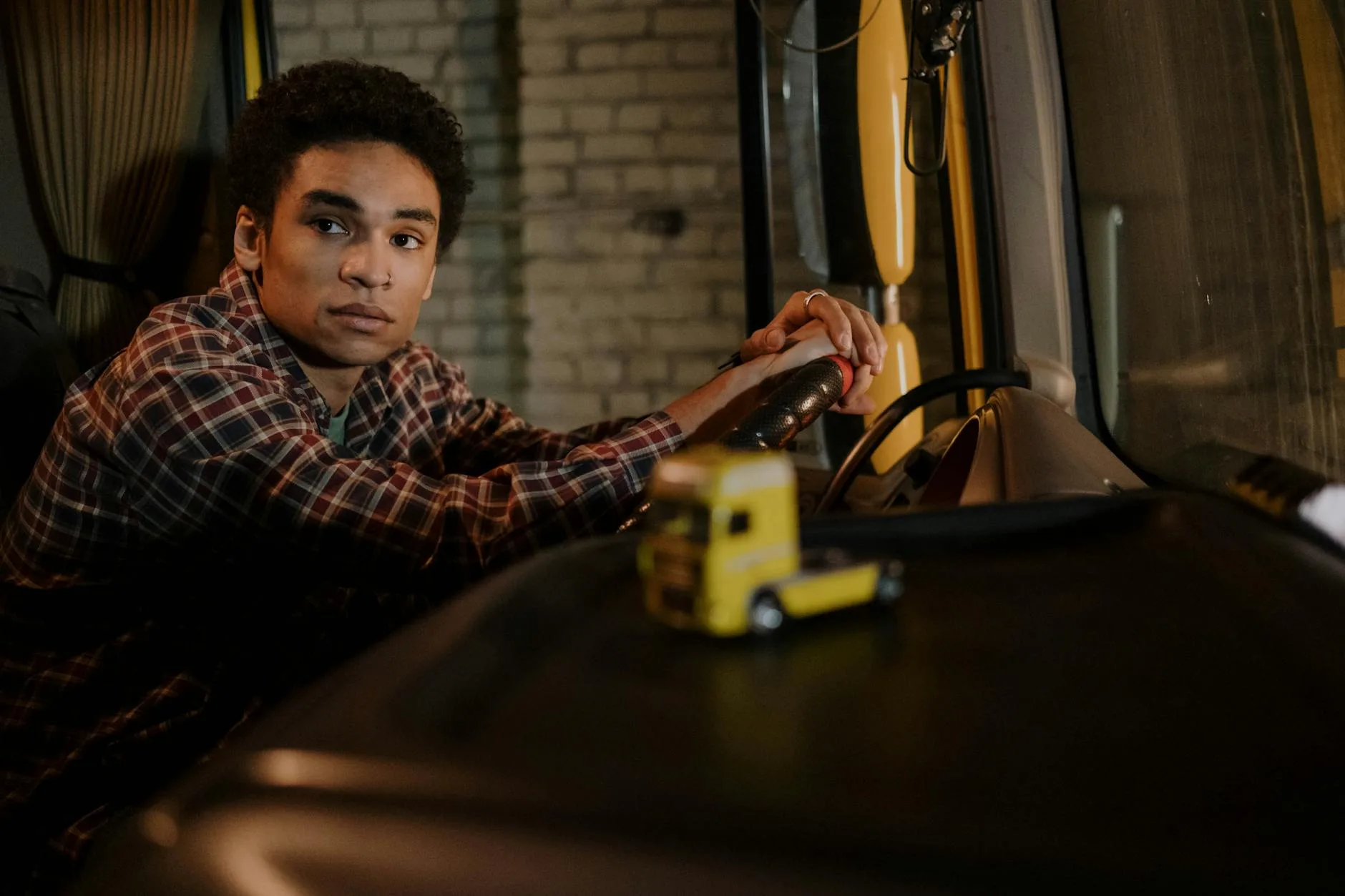Commercial driver training inside a truck cab