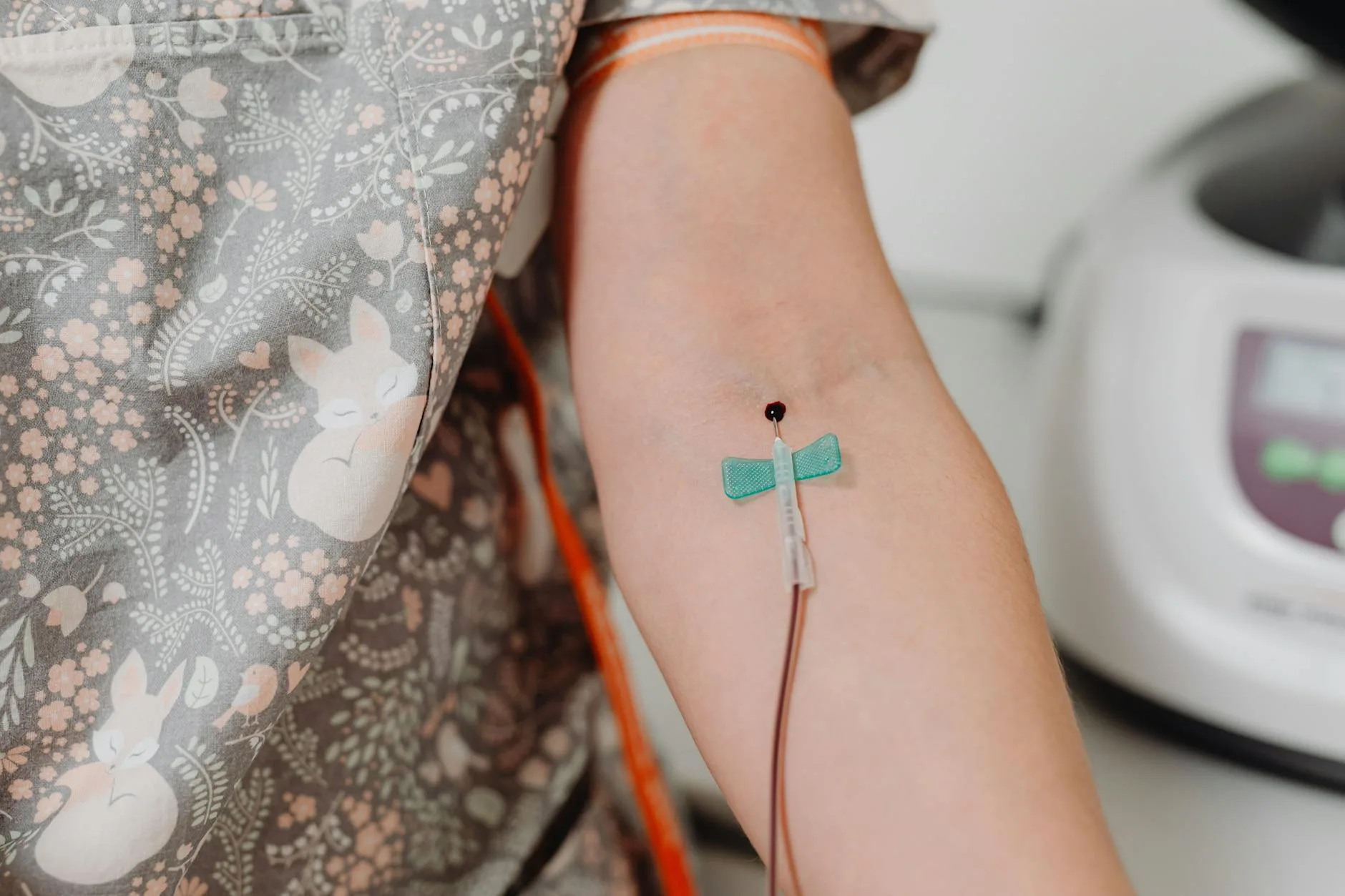 Phlebotomy student practicing venipuncture technique