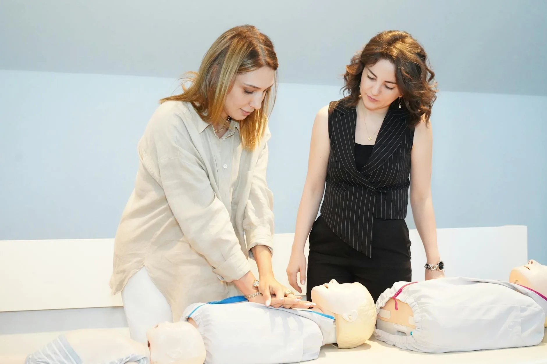 CPR certification training on a mannequin