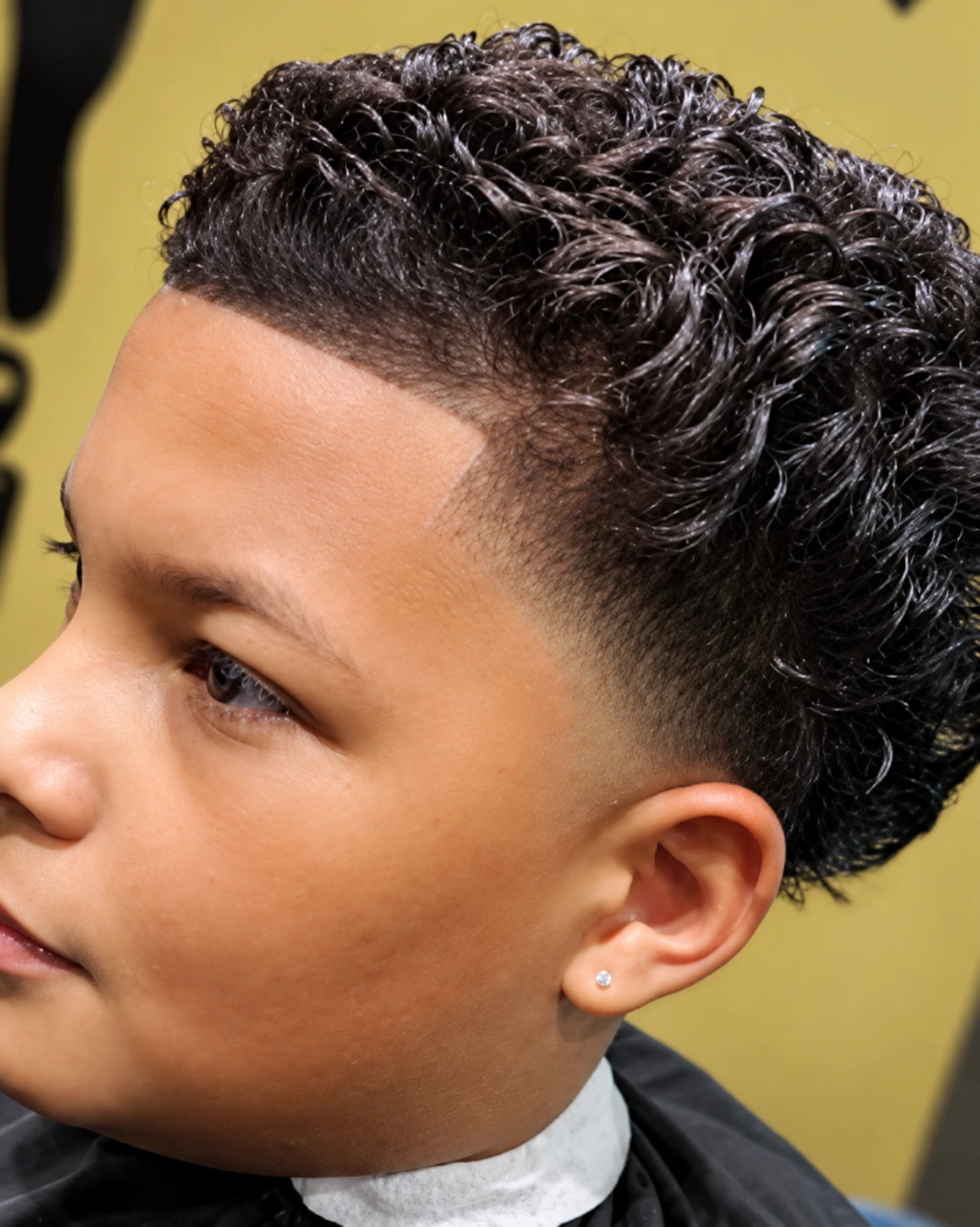 Cal’s Kutz Studio enhanced curly haircut