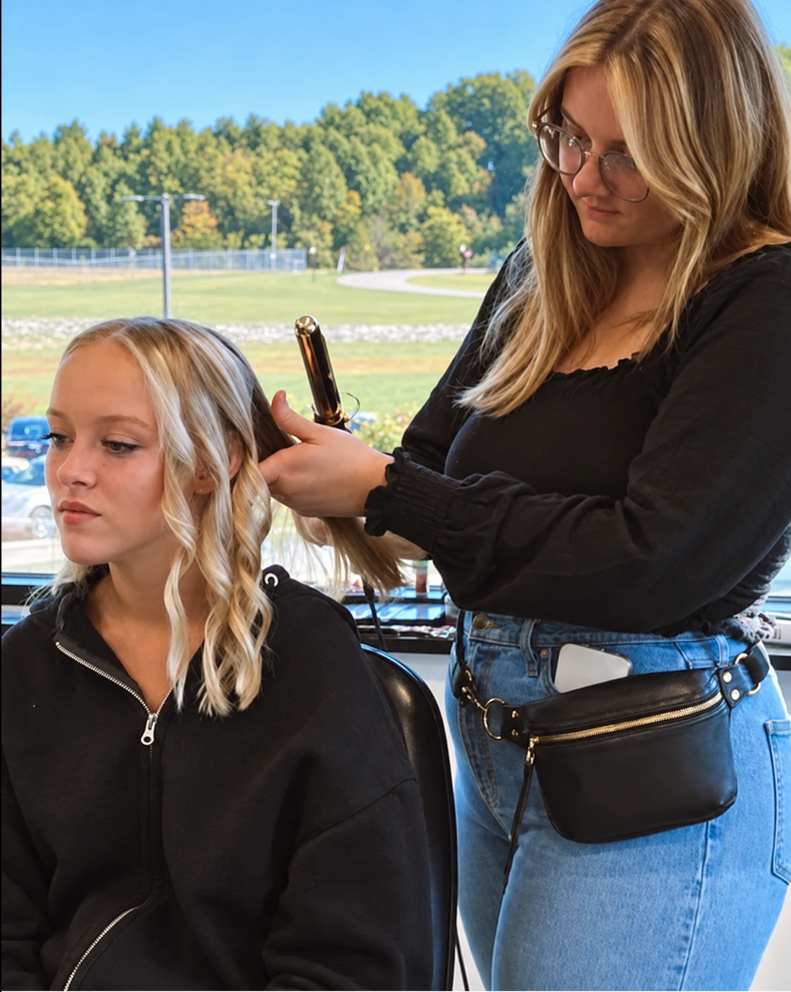 Generations Hair stylist providing hands-on client service