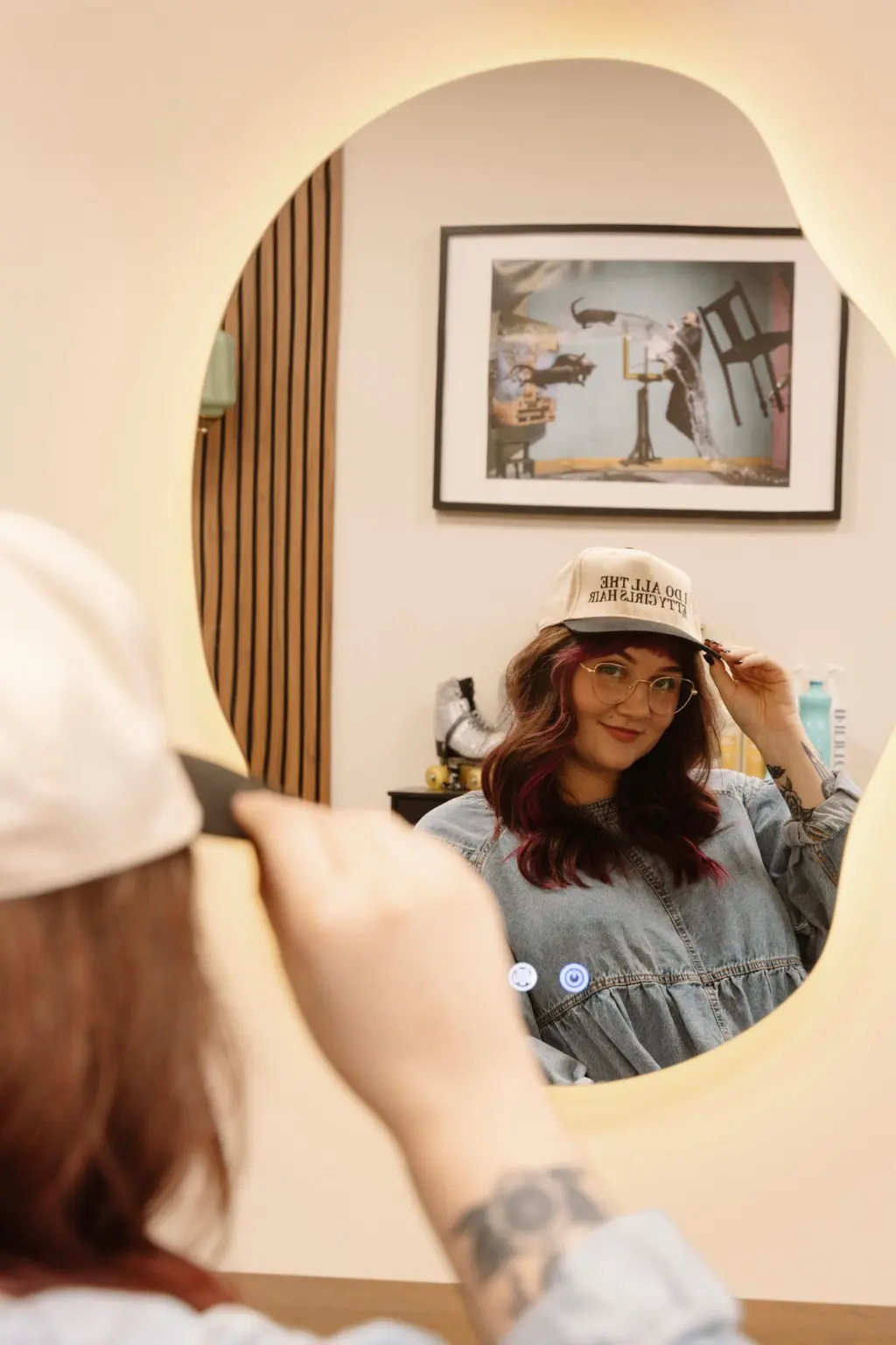 Generations Hair Co professional stylist reflected in a salon mirror